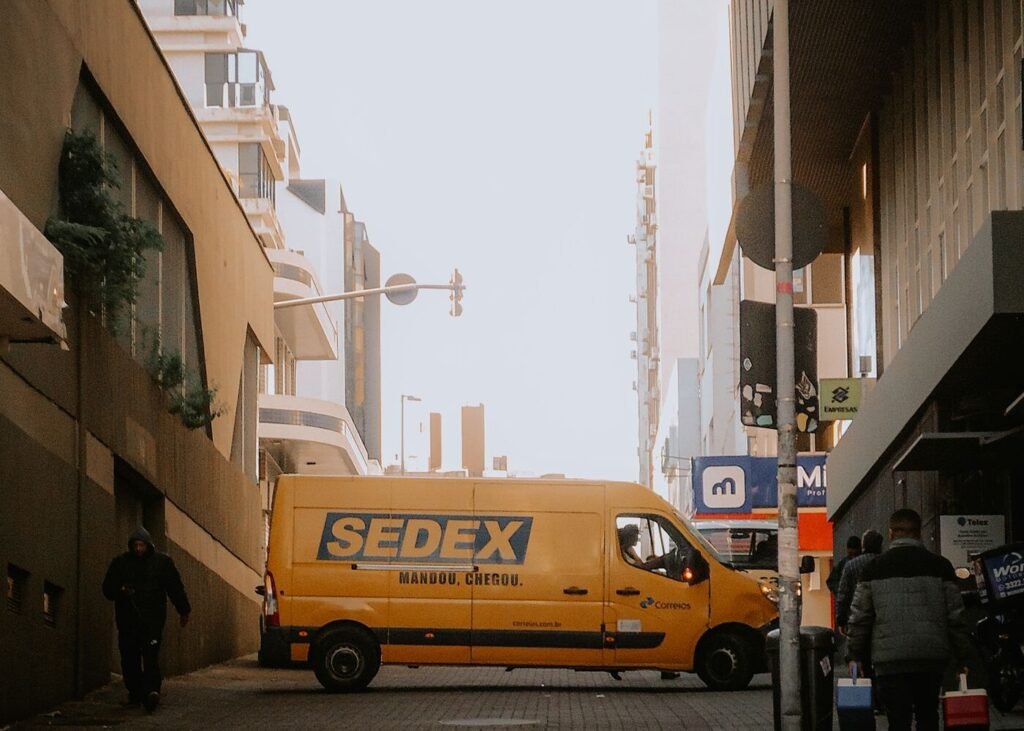 Delivery van on a city street making parcel drops