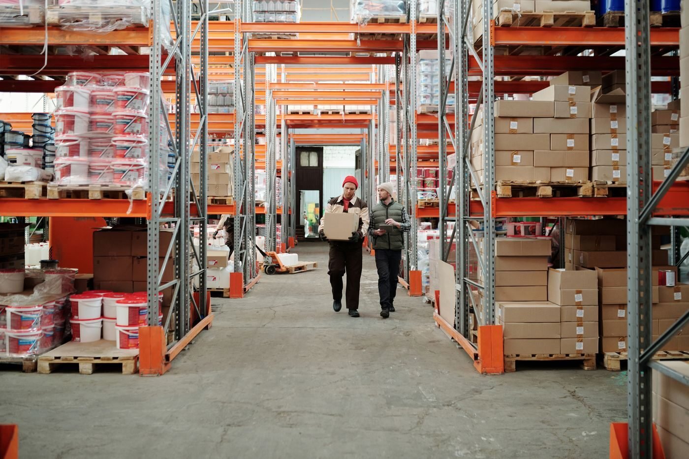 Warehouse team walking a fulfilment aisle at a UK distribution centre