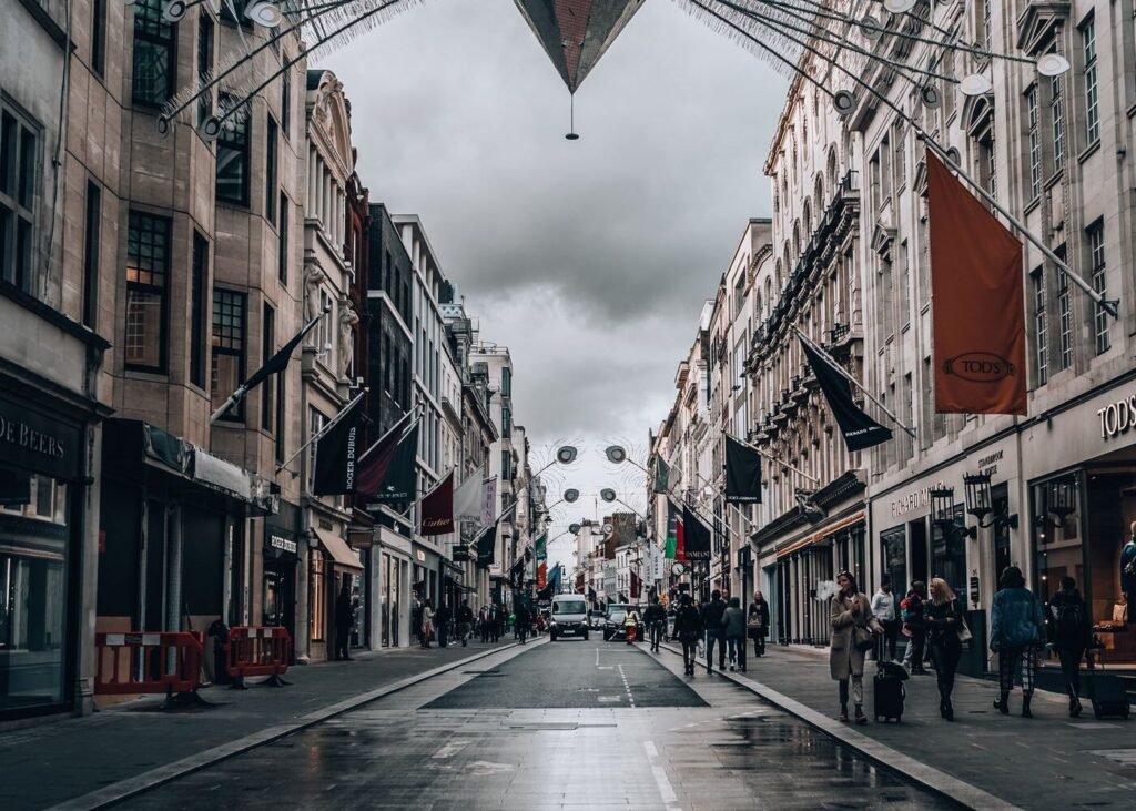 Christmas lights over a London shopping street during peak trading
