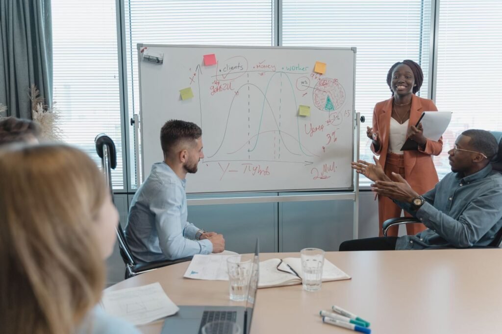 Colleagues reviewing an eCommerce plan in a conference room
