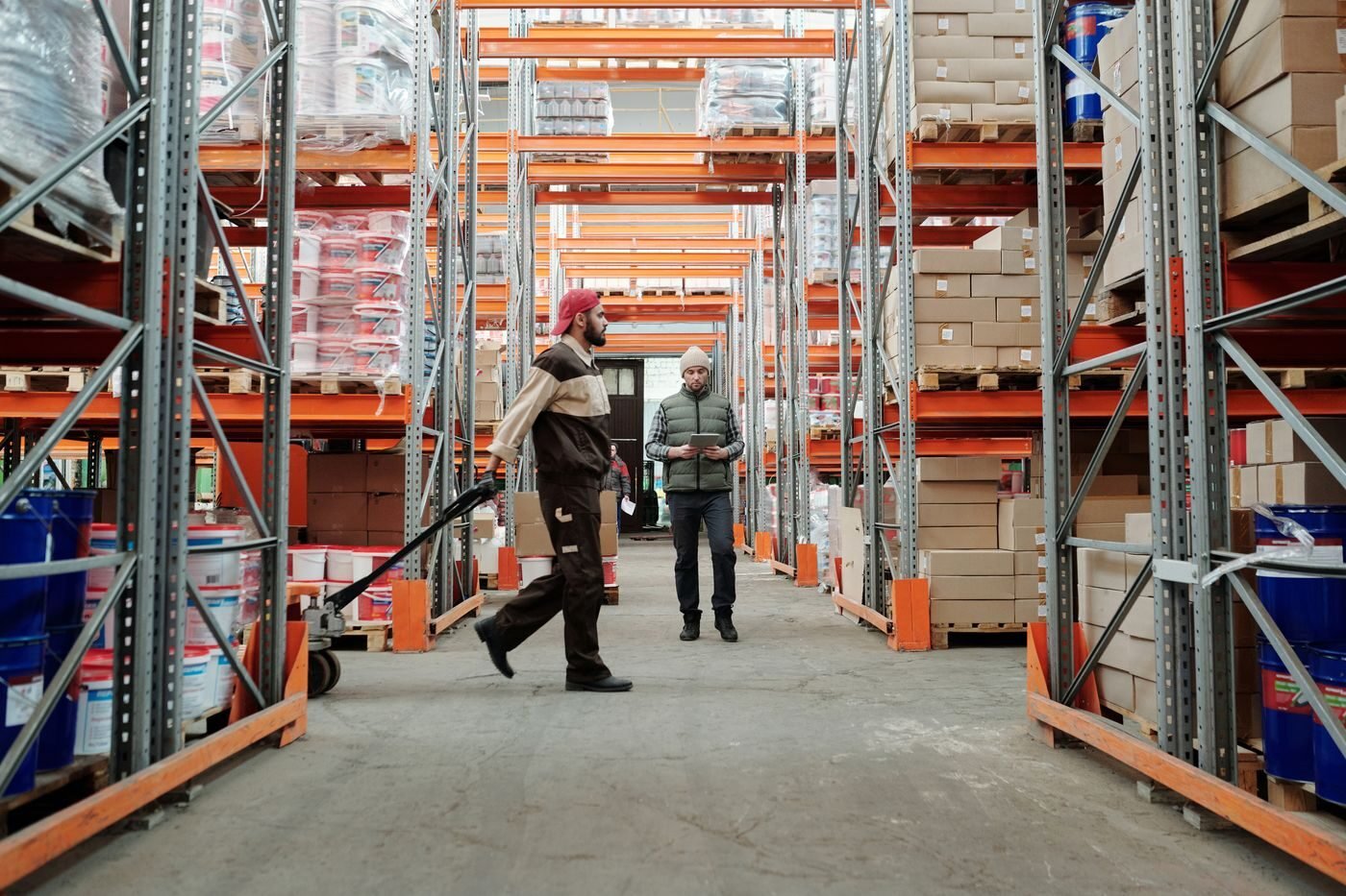 Warehouse team managing inventory in a United States fulfilment centre aisle