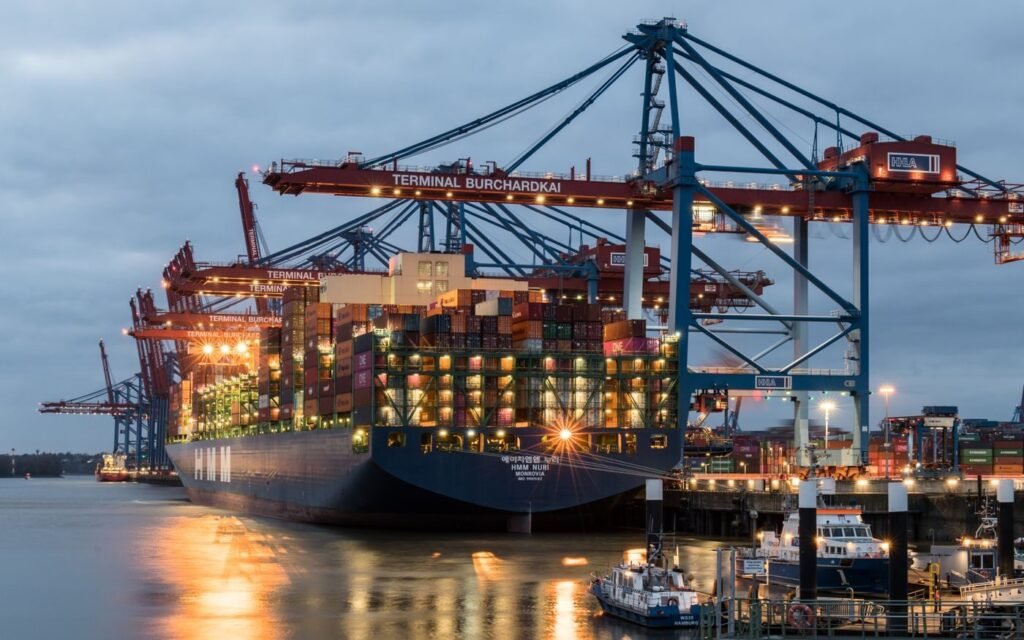 Container ships being unloaded at a major import terminal