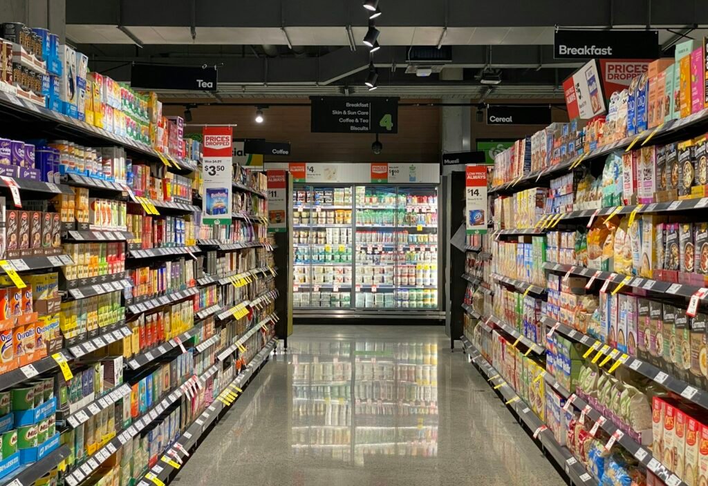 Retail store aisle with fully stocked shelves