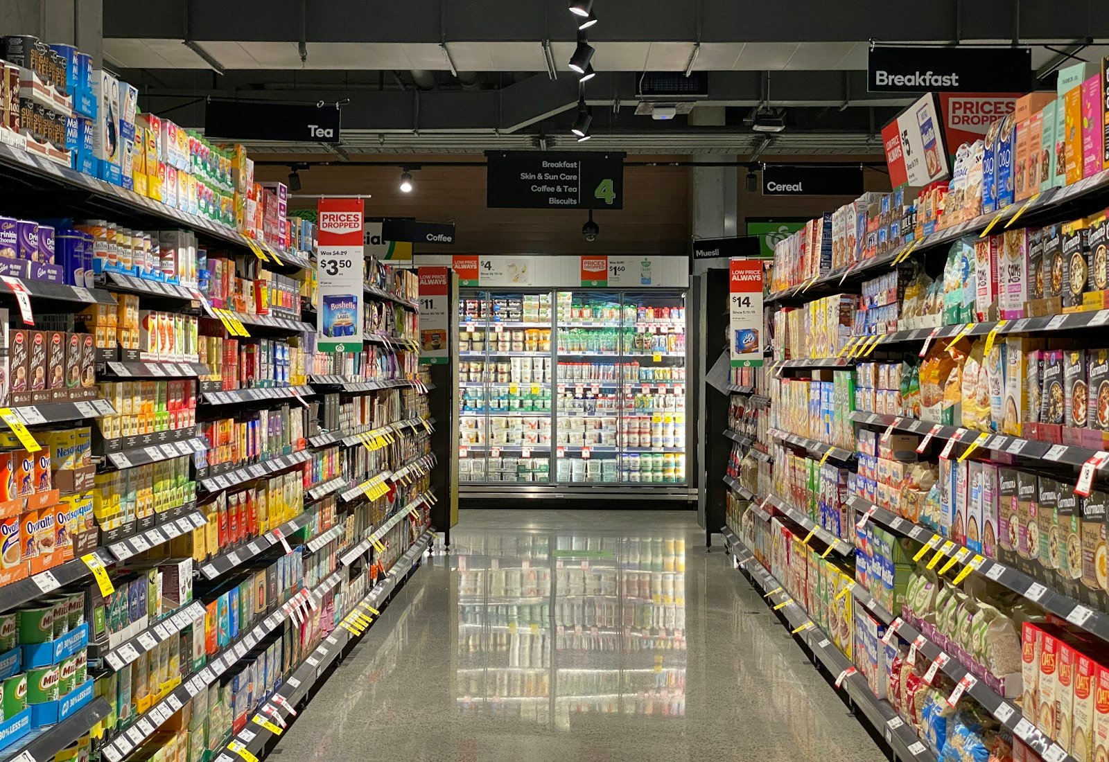 Retail store aisle with fully stocked shelves
